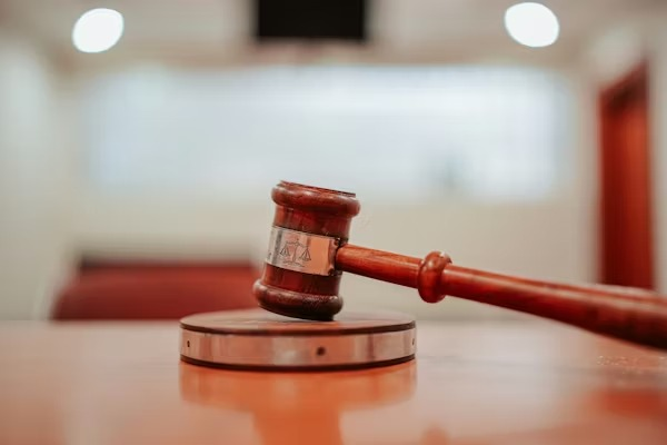 Judge’s gavel resting on a block.