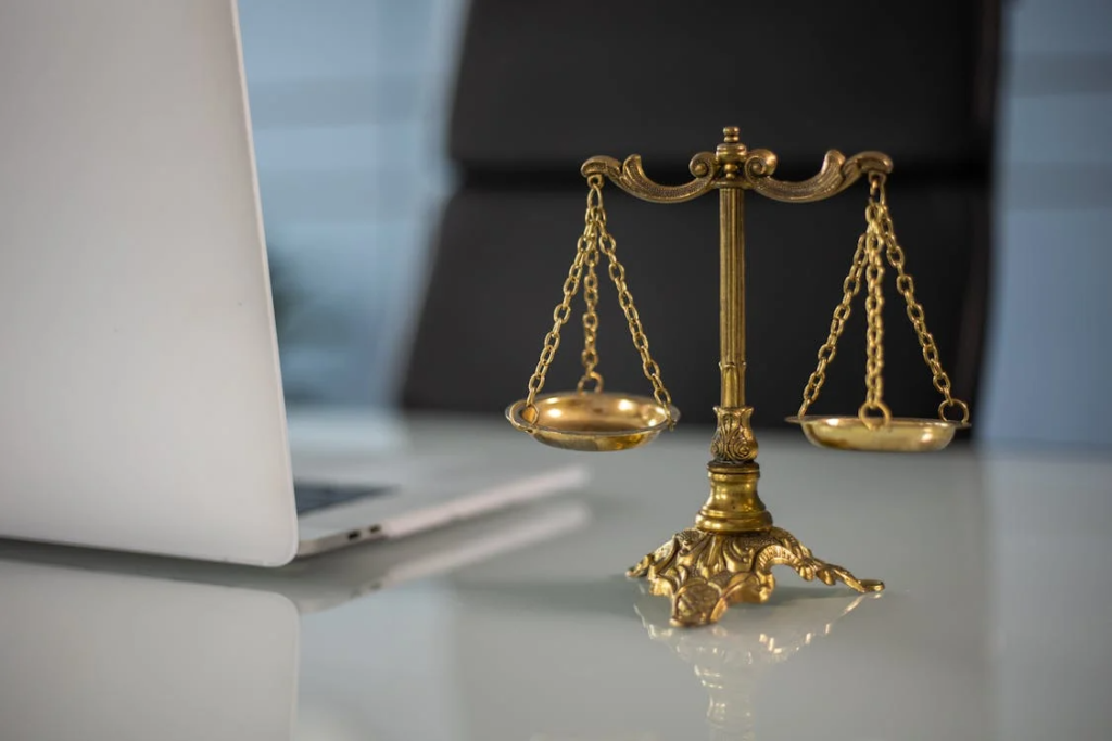 An image of a balance scale on a table