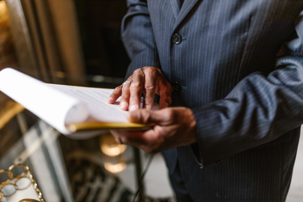 An image of a person looking at bail paperwork