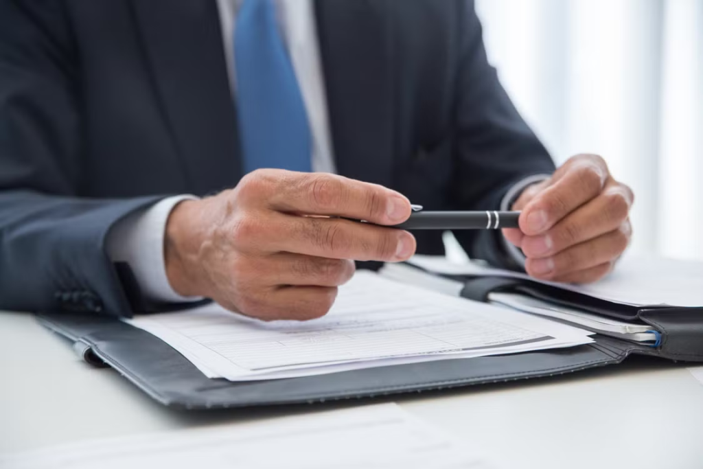 An image of a person with bail paperwork