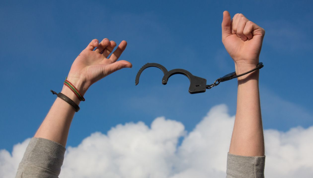 An image of a person in handcuffs